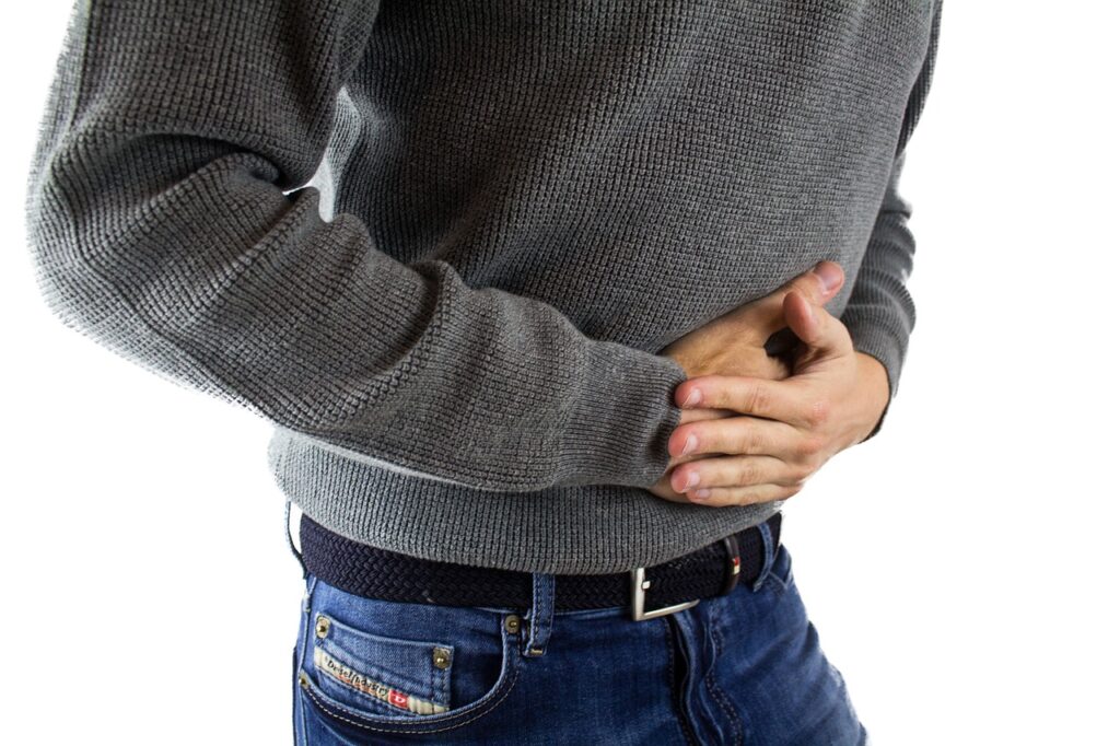 stomach pain, man, jeans-2821941.jpg